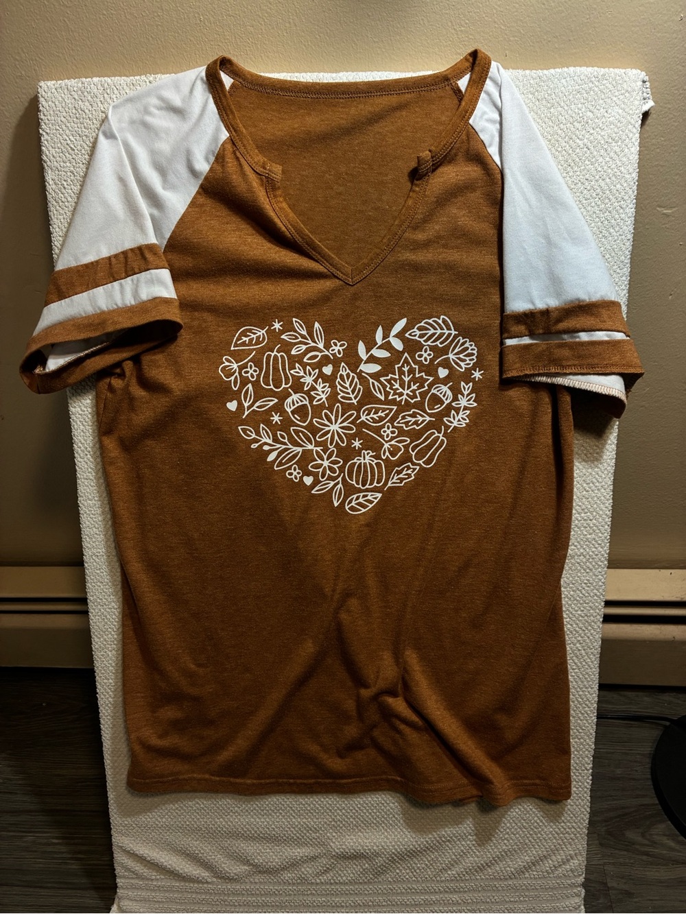 Women's Brown Short-Sleeve V-Neck Graphic Tee with White Heart Design